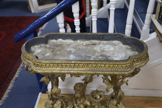 A Victorian carved giltwood and gesso jardinière table, child and trees underframe, W.83cm